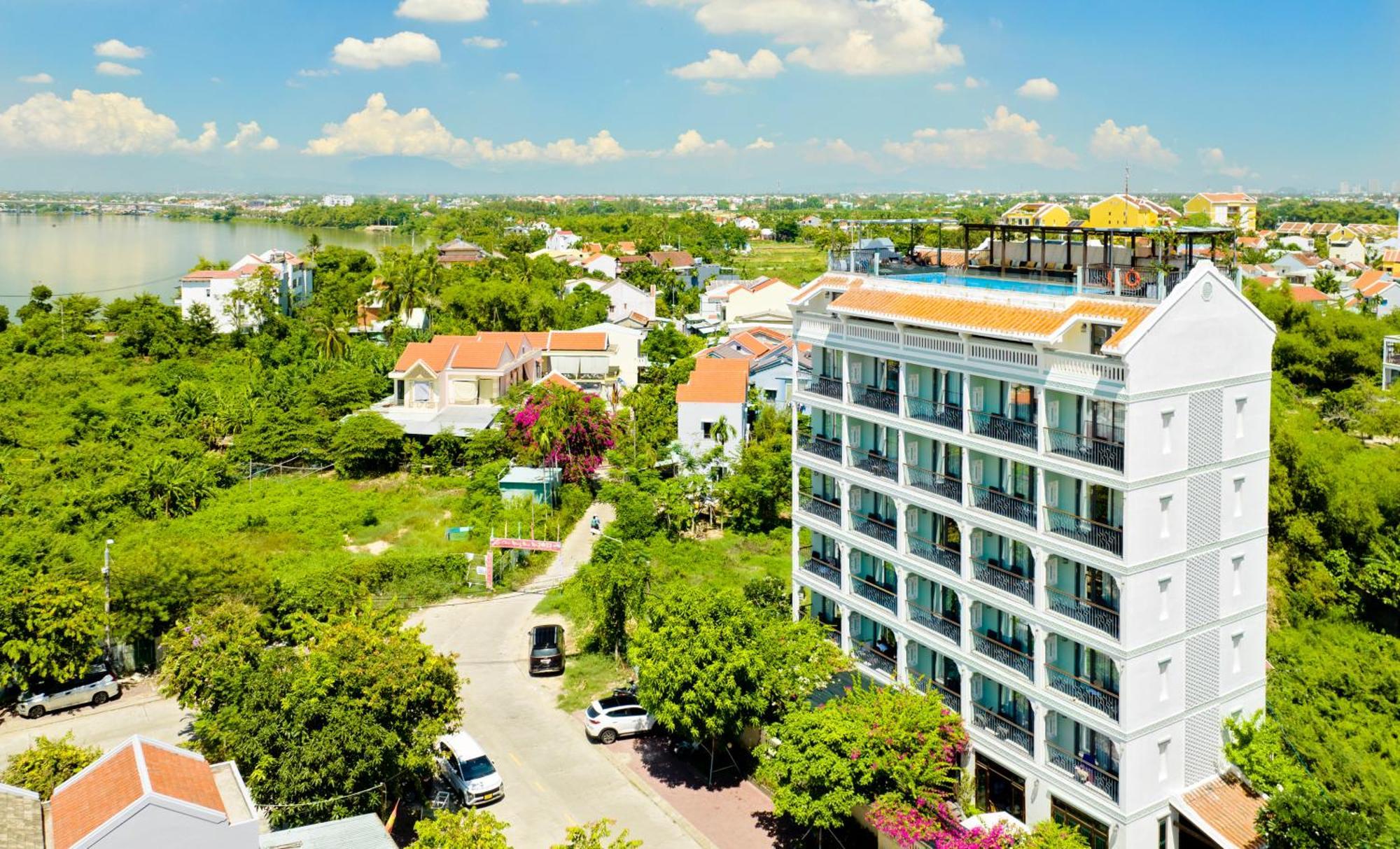 Cozy Savvy Boutique Hotel Hoi An Bagian luar foto View of the resort