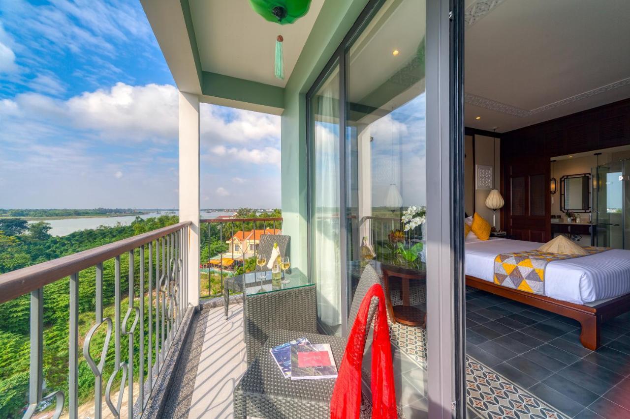 Cozy Savvy Boutique Hotel Hoi An Bagian luar foto A view of the river from a hotel room